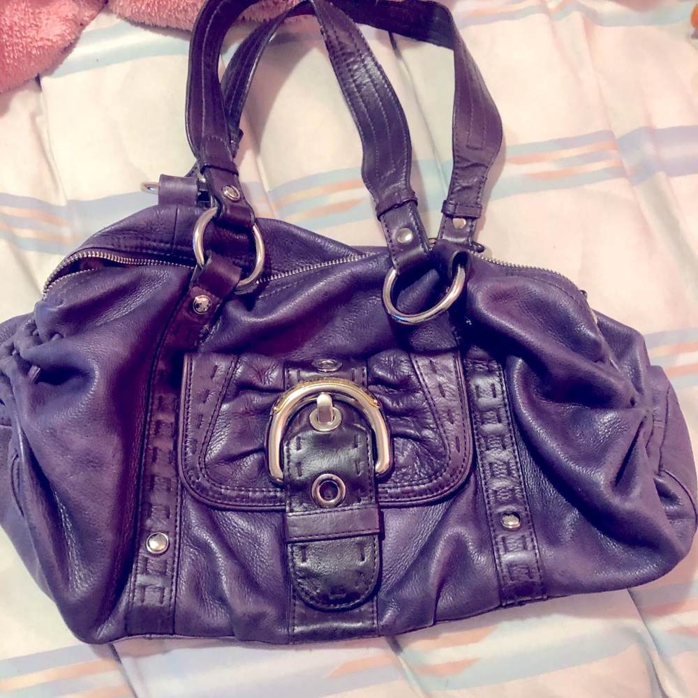Purple leather slouchy bag.